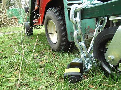Tracteur de jardin avec chaîne et vis de terre